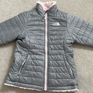 Reversible grey/pink north face jacket.